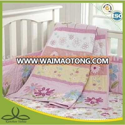 appliqued baby floral cot bumper set and quilt